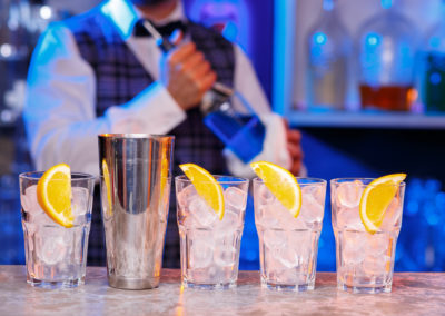 Barman at work, preparing cocktails.